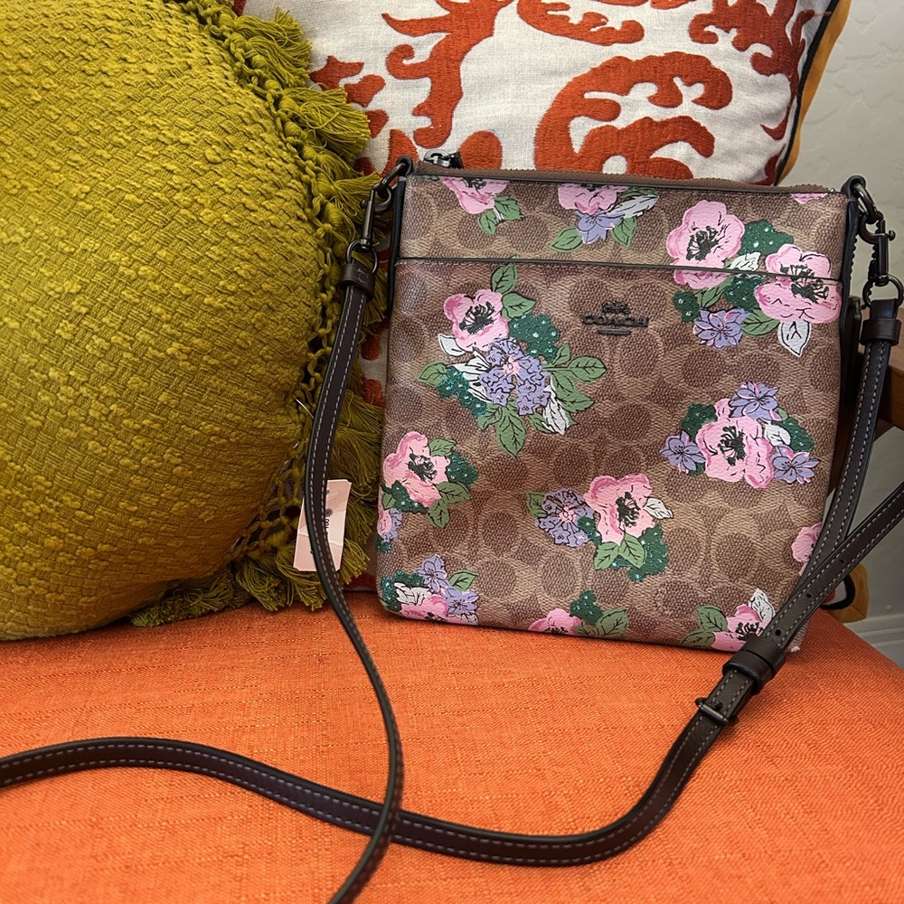 COACH Kitt Messenger Crossbody Bag in Signature Canvas with Blossom Print.